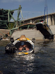 Minneapolis bridge recovery
Navy diver surfaces after ri... by Andrew Mckaskle 